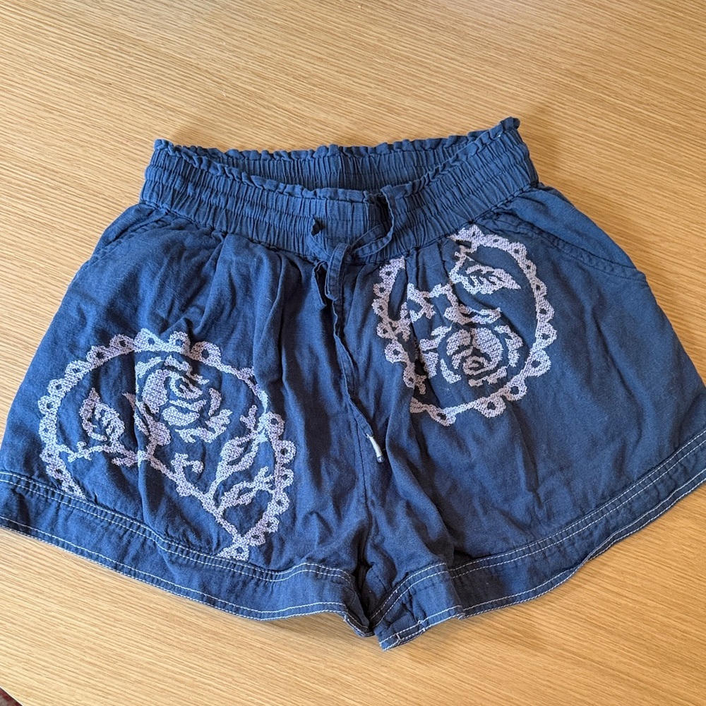 FP Movement by Free People High Waist Blue Shorts with White Embroidery